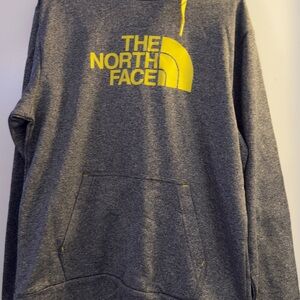 The North Face Charcoal Hoodie with Vibrant Yellow Logo